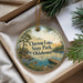 A decorative ornament with a scenic image of Clayton Lake State Park, Oklahoma, hanging from a string.