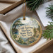 A decorative ornament with a scenic landscape of Cold Spring Harbor State Park, New York, featuring a ship and a path through the park.