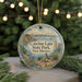 A round ornament with a scenic landscape of Conchas Lake State Park, New Mexico, featuring a bird, a boat, and a desert landscape.