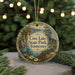 A round ornament with a scenic landscape of Cove Lake State Park, Tennessee, featuring a bird, flowers, and a path.