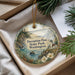A decorative ornament with a scenic landscape of a bridge, lighthouse, and water, featuring the text "Deception Pass State Park, Washington".