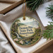 A decorative ornament with a scenic image of Denton Hill State Park, Pennsylvania, hanging from a string.