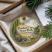 A round ornament with a scenic image of Dunbar Cave State Park, Tennessee, featuring a deer and a bridge.