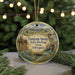 A decorative ornament featuring a wagon and a sign that says "Emigrant Springs State Heritage Area, Oregon".