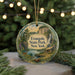 A round ornament with a scenic landscape of Evangola State Park, New York, featuring a waterfall, pine trees, and a cabin.