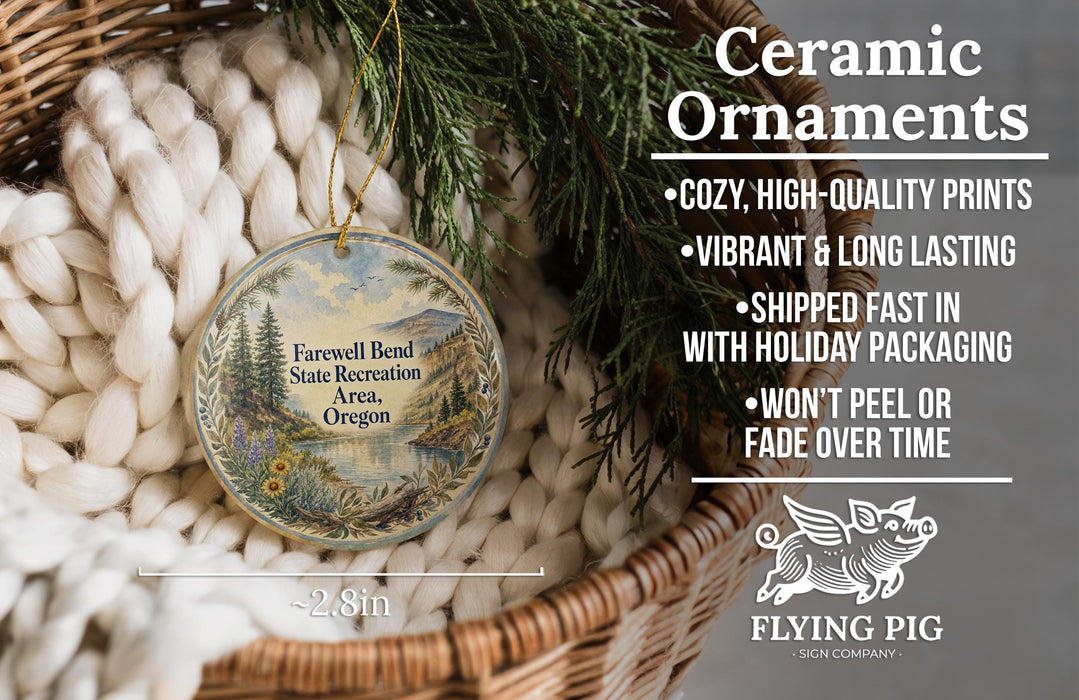 Ceramic ornaments, featuring a forest scene and a bird, are displayed in a woven basket.