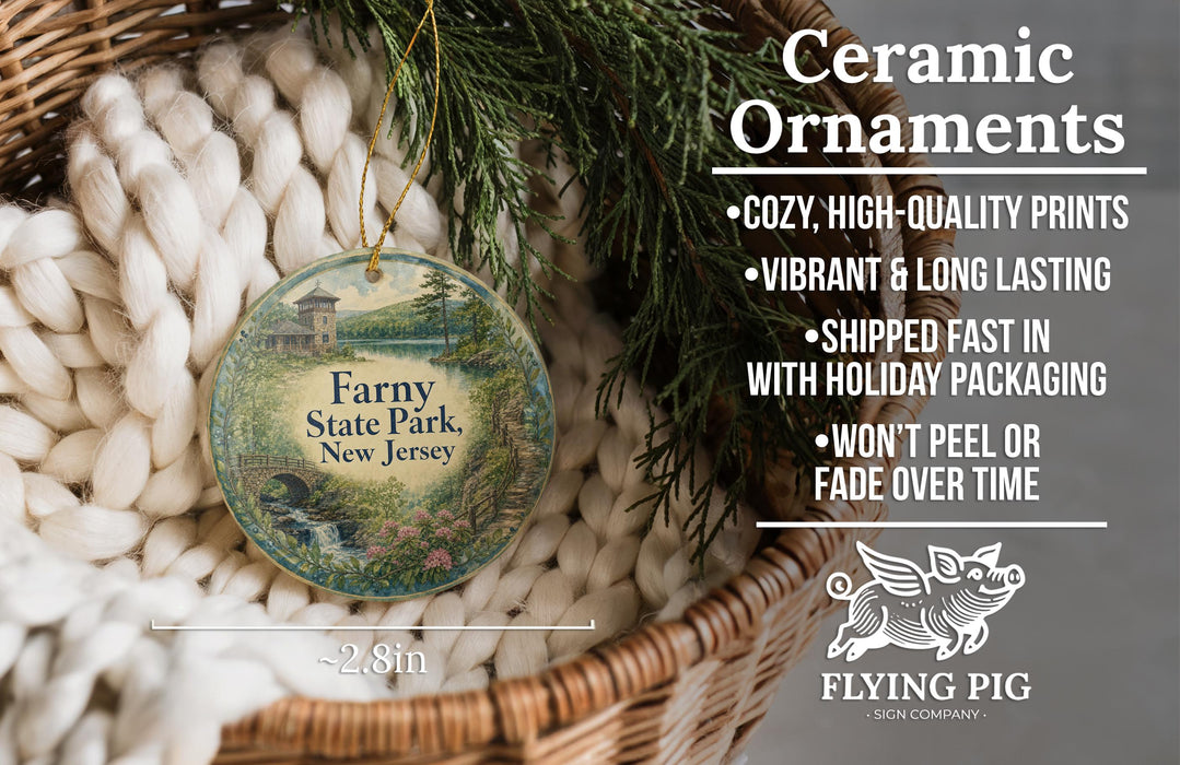 Ceramic ornaments, featuring a painting of Farny State Park in New Jersey, are displayed in a woven basket.