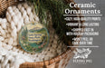 Ceramic ornaments, featuring a design of a house and trees, are displayed in a basket.