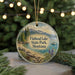 A round ornament with a scenic image of Flathead Lake State Park, Montana, featuring a lake, mountains, pine trees, and a boat on the water.