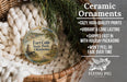 Ceramic ornaments, including a round ornament with a picture of Fort Cobb State Park, Oklahoma, and a wicker basket with greenery.