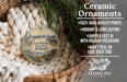 Ceramic ornaments, featuring a round ornament with a scenic image of Fort WORDEN State Park, Washington, hanging from a wicker basket.