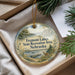 A decorative ornament with a scenic landscape of Fremont Lakes, Nebraska, featuring a deer, boats, and a river.