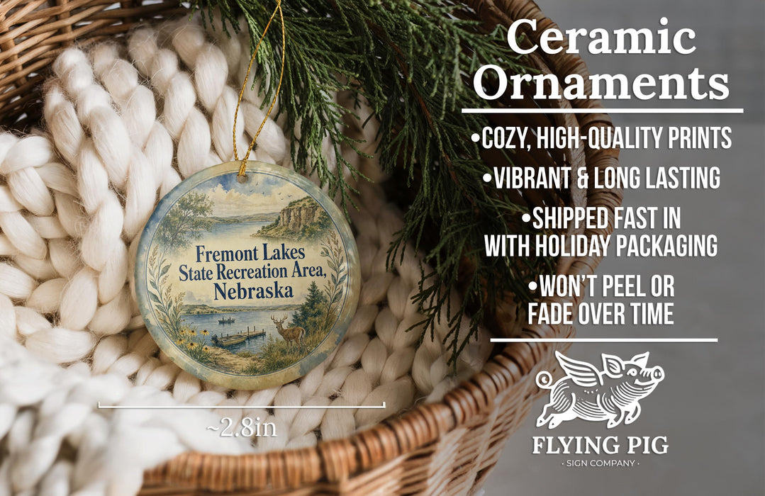 Ceramic ornaments, specifically a round ornament with a landscape design, are displayed in a basket.