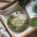 A decorative ornament with a scenic landscape of Governor Nelson State Park, Wisconsin, featuring a waterfall and pine trees.