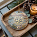 A decorative ornament featuring a scenic image of Salt Lake State Park in Utah, with pine cones and a lit candle on a wooden tray.