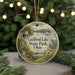 A round ornament with a scenic image of Guilford Lake State Park, Ohio, featuring a boat, a bird, and a path along the water.