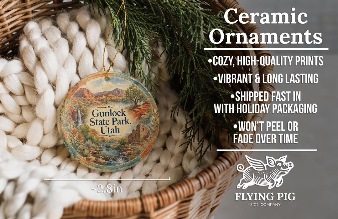 Ceramic ornaments featuring a scenic image of Gunlock State Park, Utah, hanging in a woven basket.
