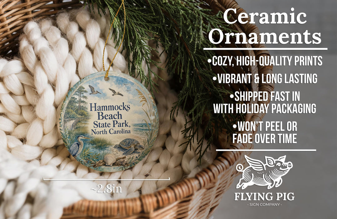Ceramic ornaments, featuring a round ornament with a bird and palm tree design, hanging from a wicker basket.