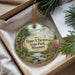 A decorative ornament with a scenic landscape of Harry S. Truman State Park, Missouri, featuring a deer, a river, and a bridge.