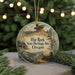 A round ornament with a scenic landscape featuring a cabin, wagon, and mountains, with the text "HAT ROCK State Heritage Site, Oregon" displayed on it.