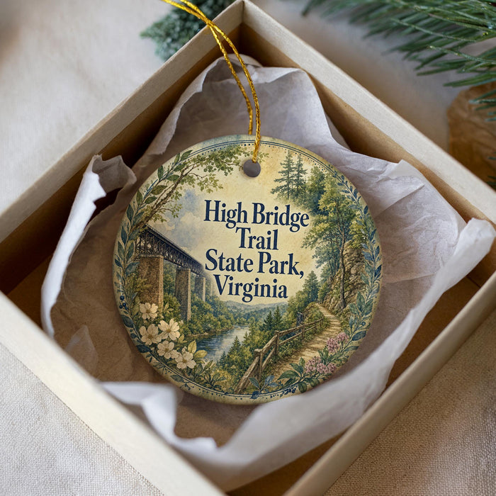 A decorative ornament in a white box, featuring a scenic illustration of the High Bridge Trail in Virginia.