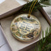 A decorative ornament in a box, featuring a train and the text "Historic Union Pacific Rail Trail State Park, Utah".