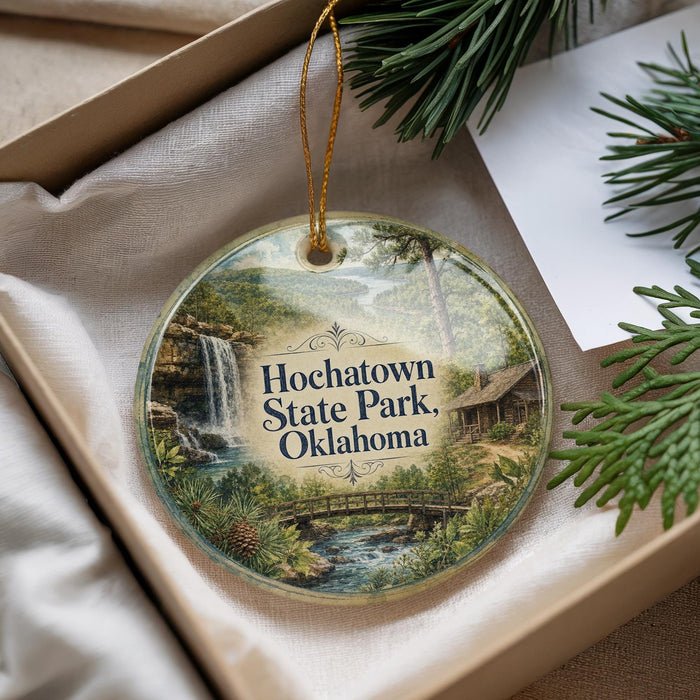A decorative ornament with a scenic image of Hochatown State Park, Oklahoma, hanging from a string.