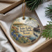 A decorative ornament in a box, featuring a scenic landscape with a lake, mountains, and a bird, along with the text "Inks Lake State Park, Texas".