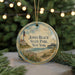 A round ornament with a lighthouse and beach scene, featuring the text "Jones Beach State Park, New York" on it.