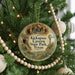 A round ornament hanging on a Christmas tree, featuring an illustration of the Kickapoo Canyon State Park in Texas.