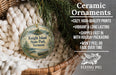 Ceramic ornaments, specifically a Knight Island State Park ornament, are displayed in a basket with pine branches. The ornament features a scenic image of a lake and a boat. The text highlights the ornament's features, such as being cozy, high-quality, vibrant, and long-lasting, and mentions that it is shipped fast in holiday packaging, won't peel, and fades over time.
