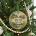 A round ornament hanging on a Christmas tree, featuring a scenic illustration of Knox Farm and State Park in New York.