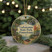 A round ornament featuring a scenic landscape of Lackawanna State Park, Pennsylvania, with a bridge, trees, and a lake in the background.