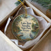 A decorative ornament in a box, featuring a scenic image of Lake Bob Sandlin State Park, Texas.