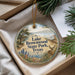 A decorative ornament with a landscape scene featuring Lake Brownwood State Park, Texas, and pine branches.