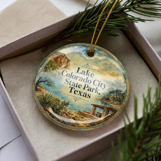 A decorative ornament with a scenic landscape of Lake, Colorado City, State Park, and Texas, featuring a desert landscape, a cactus, and a building.