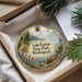 A decorative ornament with a scenic landscape featuring Lake Easton State Park in Washington, featuring a canoe on the water and pine trees in the background.