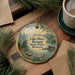 A decorative ornament featuring a scenic landscape of Lake Mary Ronan State Park in Montana, with pine trees and a lake in the background.