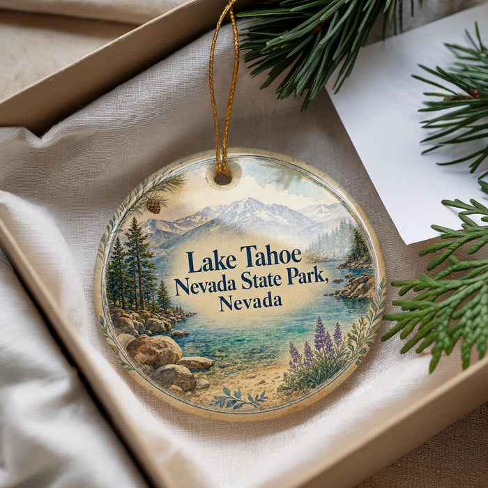 A decorative ornament with a scenic image of Lake Tahoe, Nevada, featuring mountains, pine trees, and a lake.