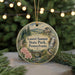 A round ornament with a scenic image of Laurel Summit State Park, Pennsylvania, featuring a bird, flowers, and a waterfall.
