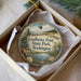 A circular ornament with a scenic landscape of Leadbetter Point State Park, Washington, featuring a bird, pine trees, and a body of water.