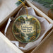 A round ornament with a scenic landscape of a waterfall and trees, featuring the text "Litchworth State Park, New York" on it.