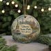 A decorative ornament featuring the Statue of Liberty and Liberty State Park in New Jersey, with a background of a city skyline.