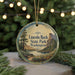A round ornament with a scenic landscape of a lake, mountains, and pine trees, featuring the text "Lincoln Rock State Park, Washington".