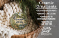 Ceramic ornaments, featuring a detailed image of a bird and a landscape, are displayed in a woven basket.