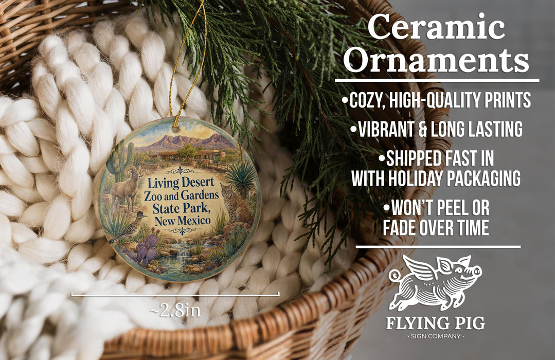 Ceramic ornaments, featuring a desert landscape with a cactus and mountains, are displayed in a basket.