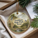 A decorative ornament with a scenic landscape of Lockhart State Park, Texas, featuring a house, a bridge, and a stream.