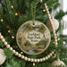 A round ornament hanging on a Christmas tree, featuring a scenic image of Lockhart State Park, Texas.
