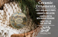 Ceramic ornaments, specifically Logan State Park, Montana ornaments, are displayed in a basket with pine branches.