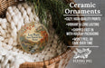 Ceramic ornaments, featuring a nature scene with a river and mountains, are displayed in a basket.